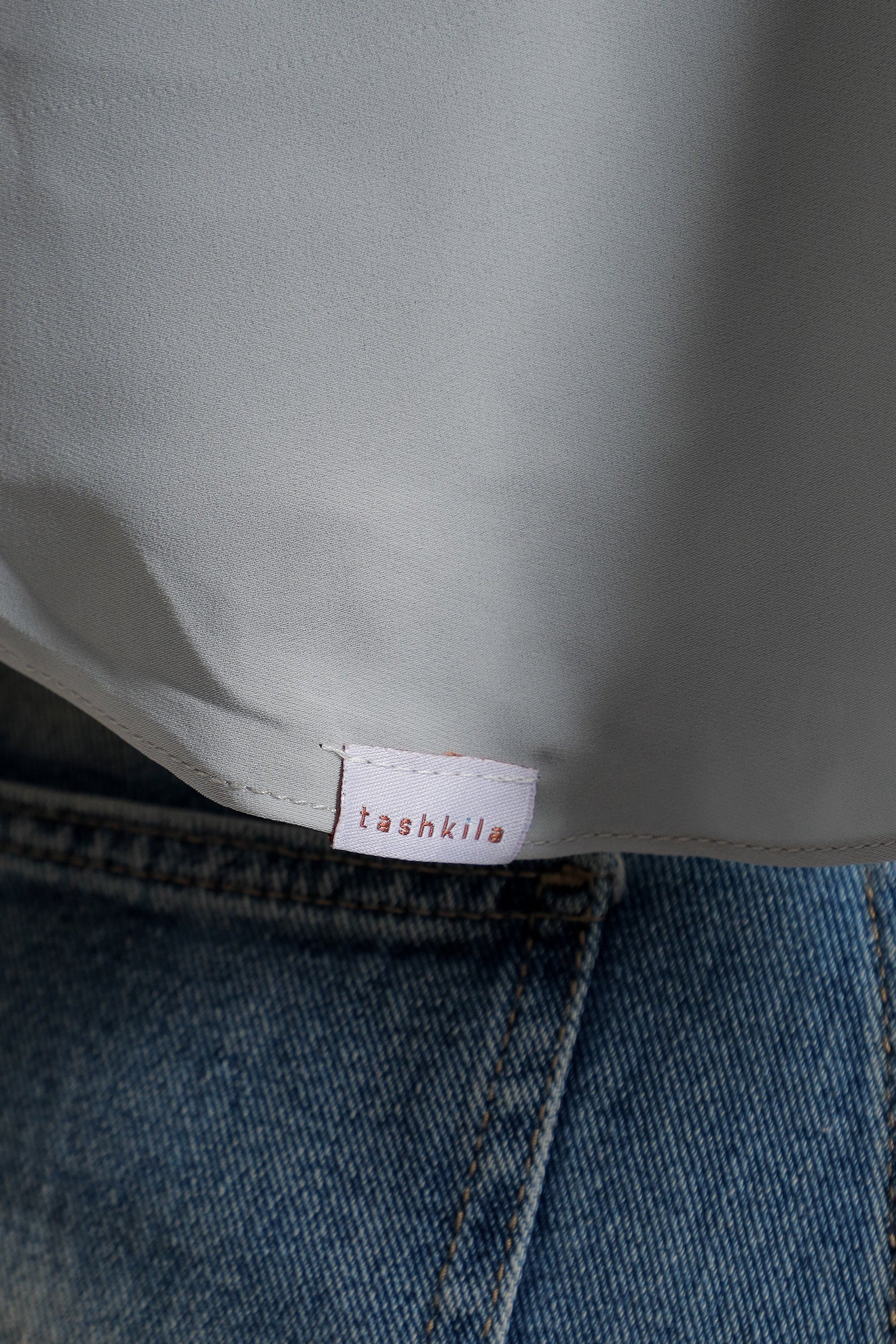 Close-up of a label on a garment with a blurred background